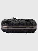 Elegant black clutch featuring sequined appliqué, removable chain, and clasp closure, designed for night-out essentials.