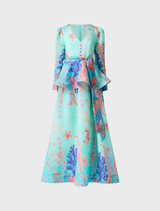 Stylish coral long sleeve maxi dress in blue multi colors, featuring a flowing design ideal for casual or formal events.