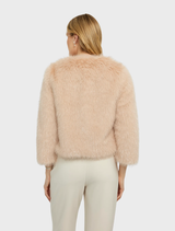 Chic blush faux fur jacket with a luxurious feel, ideal for adding a touch of elegance to any outfit.
