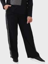 Black trousers featuring embellished trim, offering a stylish and elegant look for various occasions.