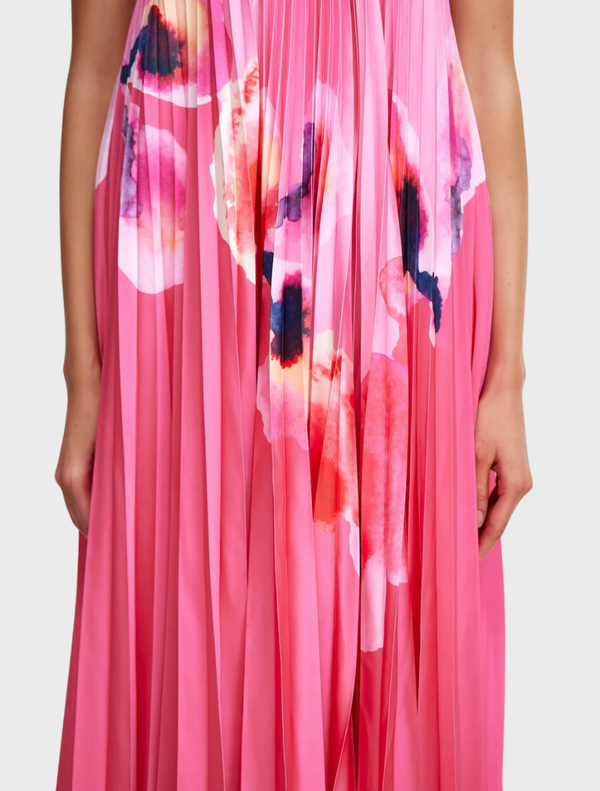 Elegant Fixby Maxi Dress showcasing a colorful floral print, ideal for warm weather and stylish gatherings.