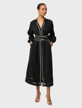 Black Tencel maxi dress by Rhea, showcasing exquisite embroidery and a graceful, flowing design.