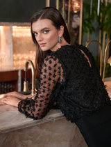 Wide leg jumpsuit in black, model 263723, offering a stylish and relaxed fit for versatile wear.