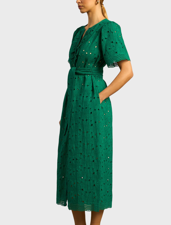 Voyage Dress in rich emerald green, featuring a flattering design ideal for special events and stylish gatherings.