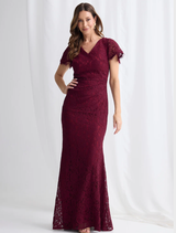 A wine-colored Emery lace dress featuring intricate lace detailing and a fitted silhouette.