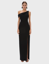 Elegant black Emile gown displayed on a mannequin, showcasing its flowing fabric and sophisticated design.