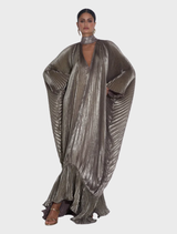 Dark gold shimmer Empire Gown with deep V neckline, dramatic sleeves, and billowy hemline featuring soft ruffle finish.