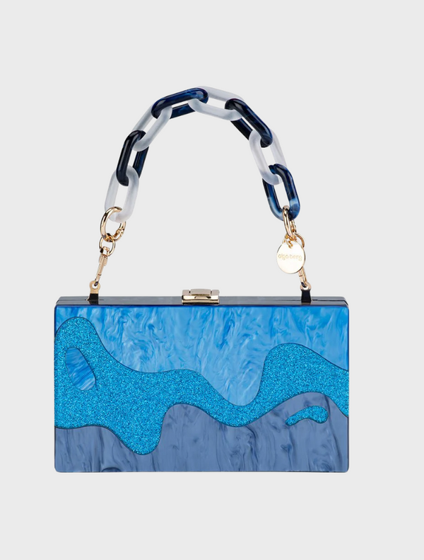A blue and white purse featuring a stylish chain strap, ideal for casual or formal occasions.