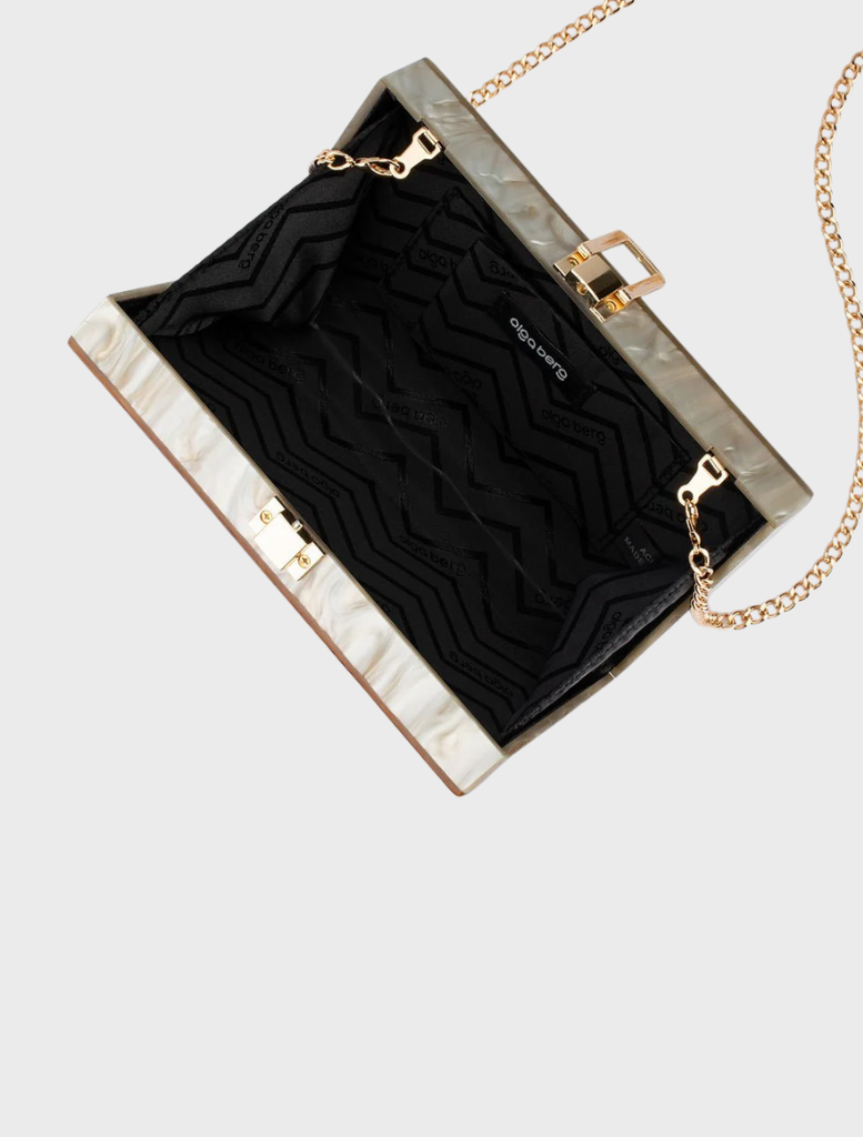 Chic gold and white handbag with a fashionable chain strap, ideal for any stylish outfit.