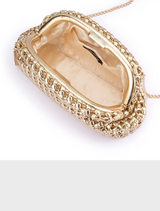  Elegant gold clutch bag made from woven material, featuring a textured surface and sophisticated appearance.