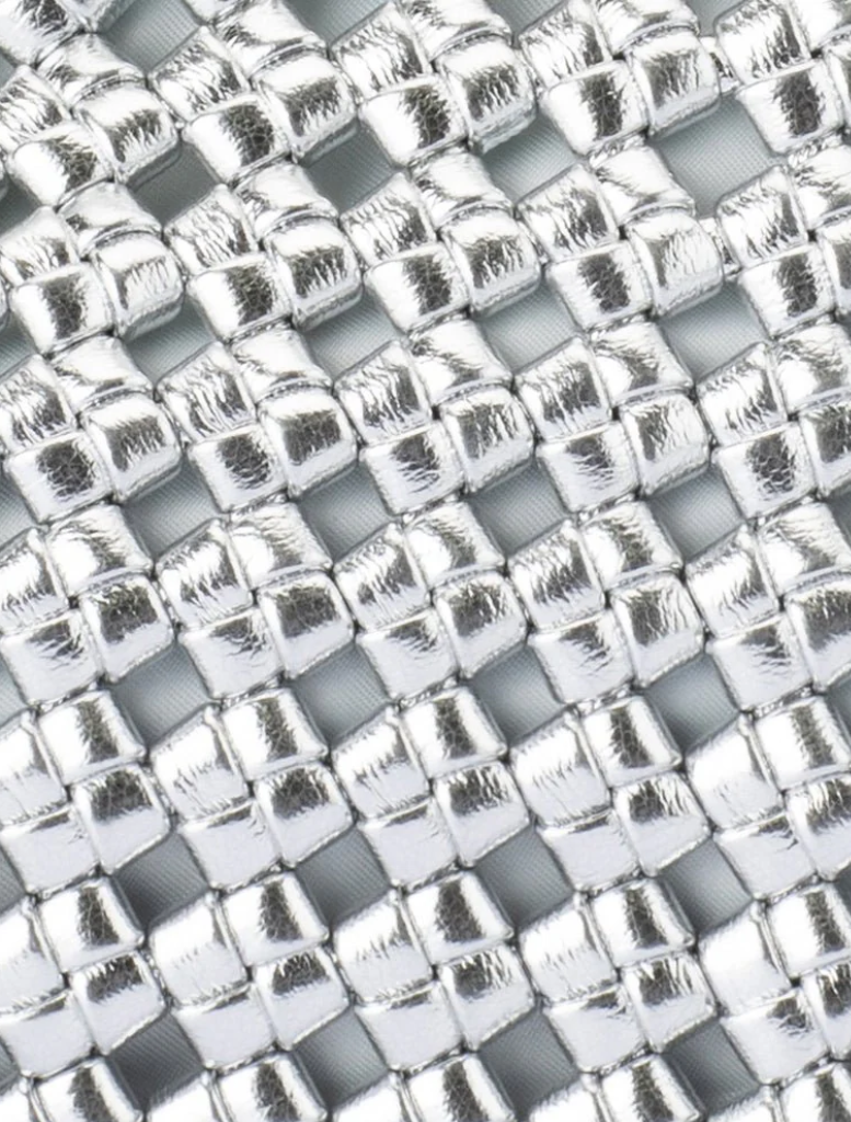 silver clutch bag showcasing a fashionable chain design, perfect for complementing formal attire.