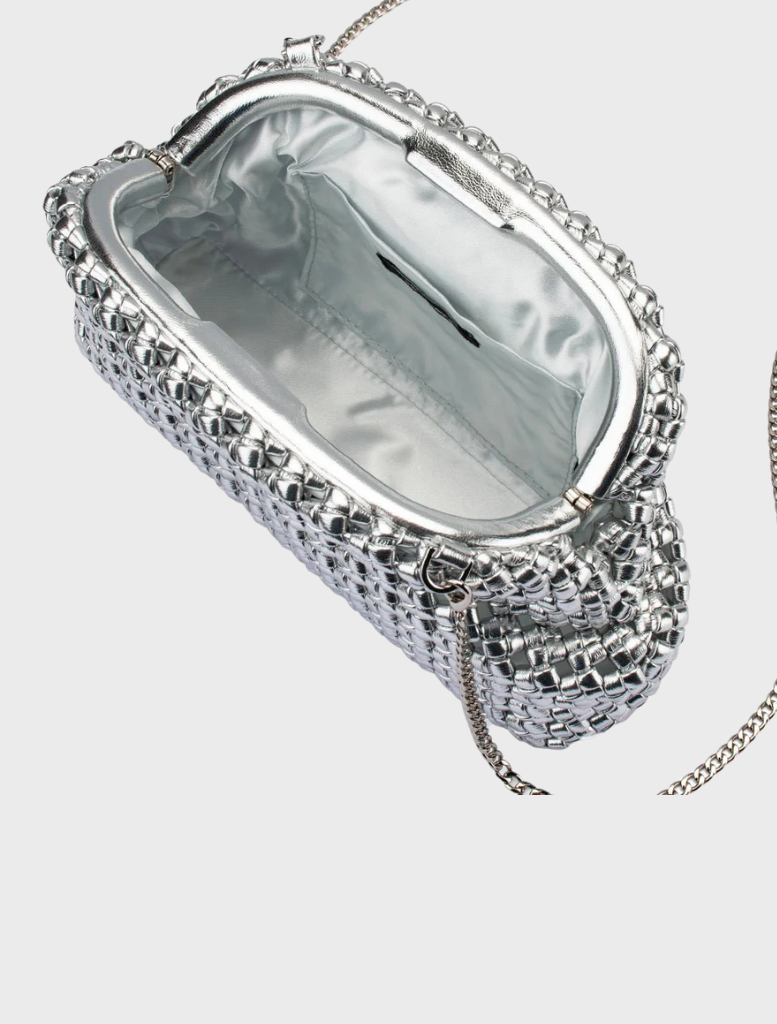 A sleek silver clutch bag with a unique chain pattern, suitable for evening wear or special occasions.