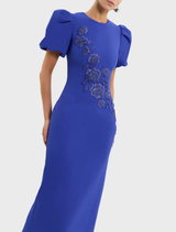 Chic ultramarine blue midi dress with puff sleeves by Evolet, combining elegance and comfort for any formal gathering.