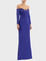 Sophisticated ultramarine blue gown with off-the-shoulder design, highlighting a graceful and flowing silhouette.