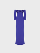 Off-the-shoulder ultramarine blue gown, elegantly draped, showcasing a flowing silhouette and sophisticated design.