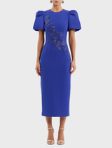 Elegant Evolet midi dress in ultramarine blue with puff sleeves and a flattering silhouette, ideal for special events.
