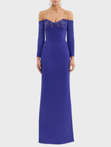 Elegant off-the-shoulder gown in ultramarine blue, featuring a flowing design that enhances the wearer's silhouette.