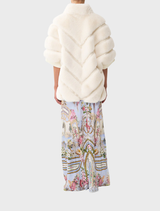Faux fur slouch jacket with short sleeves, highlighted by a fashionable tiled design, perfect for a casual outfit.