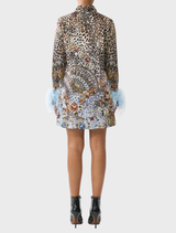 Elegant mini shirt dress adorned with feathers, showcasing a flamenco fan print and a flowing silhouette.