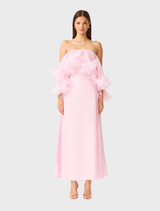 Strapless pale pink gown by Fiorina, featuring a fitted bodice and flowing skirt, ideal for formal occasions.
