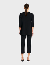 Comfortable black top and pants crafted from a soft, stretchy material for ease of movement.