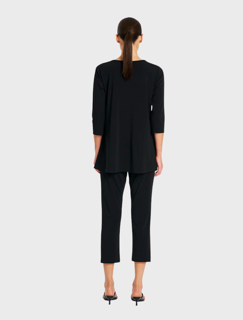 Comfortable black top and pants crafted from a soft, stretchy material for ease of movement.