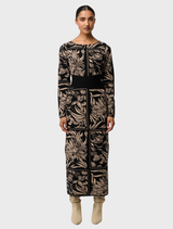Flora Deco floral knit dress made from a merino wool blend, suitable for various events with its elegant design.