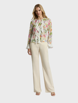 Stylish ivory floral top, showcasing a beautiful pattern for a fresh and vibrant look.