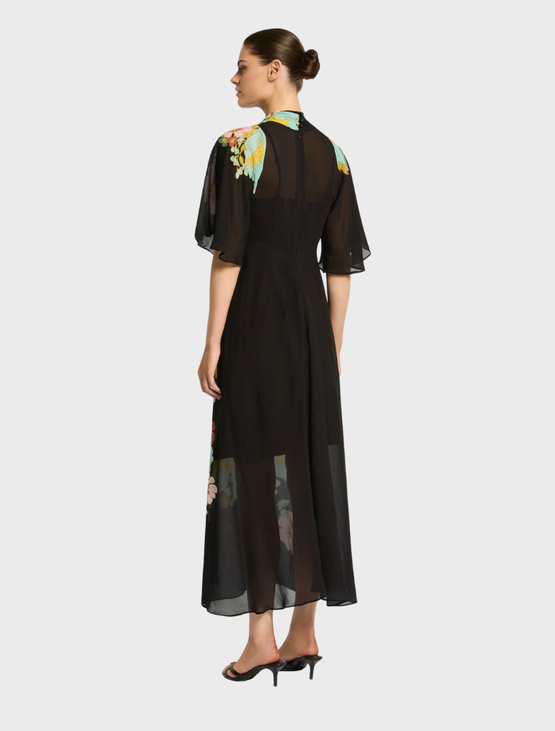 Black dress featuring a floral print, named Julia Maxi Dark Ink Floral, elegantly designed for a stylish look.