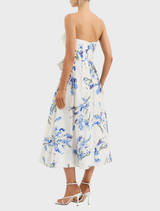 Charming Bluebell Meadow Midi Dress with a lively floral design, suitable for both daytime and evening wear.