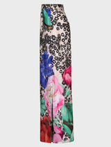 Vintage floral wide-leg trousers featuring dramatic side splits, elastic waistband, and side pockets for a stylish, comfortable fit.