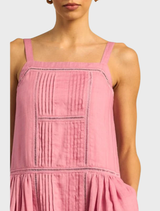 Floss-colored Altitude Dress, showcasing a graceful fit and stylish design, ideal for special events.