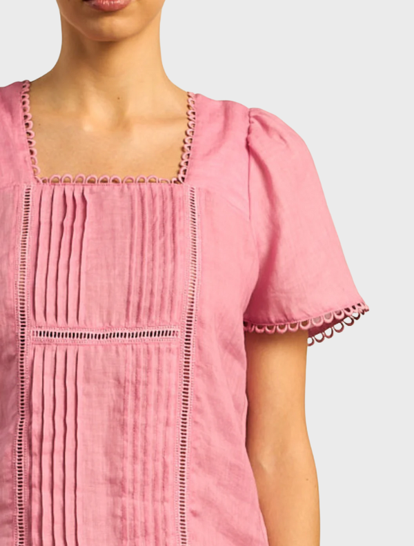 Yonder Top - Floss, showcasing a modern silhouette with intricate detailing, ideal for versatile styling options.
