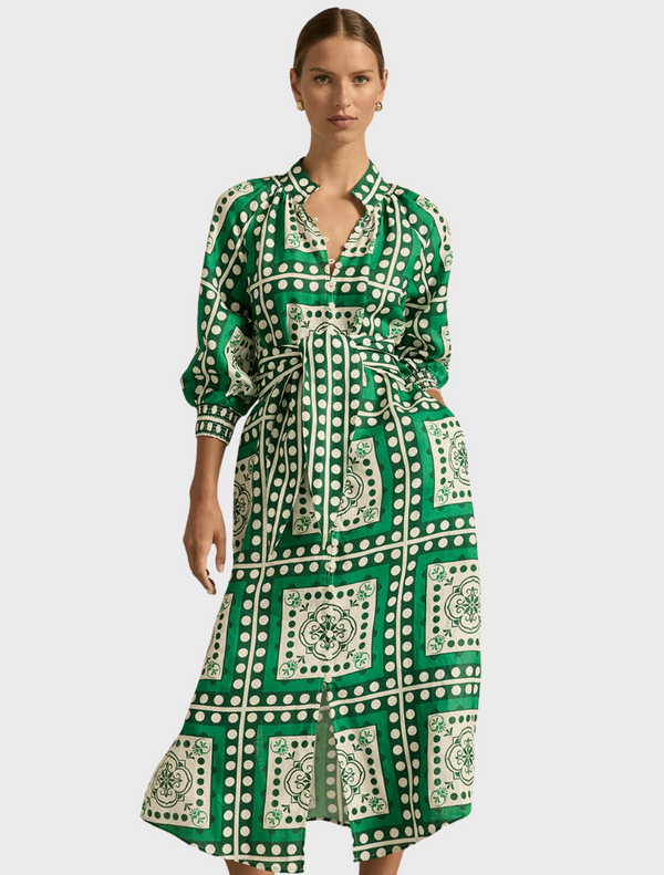 Long sleeve green and white shirt dress featuring a square pattern throughout the fabric.