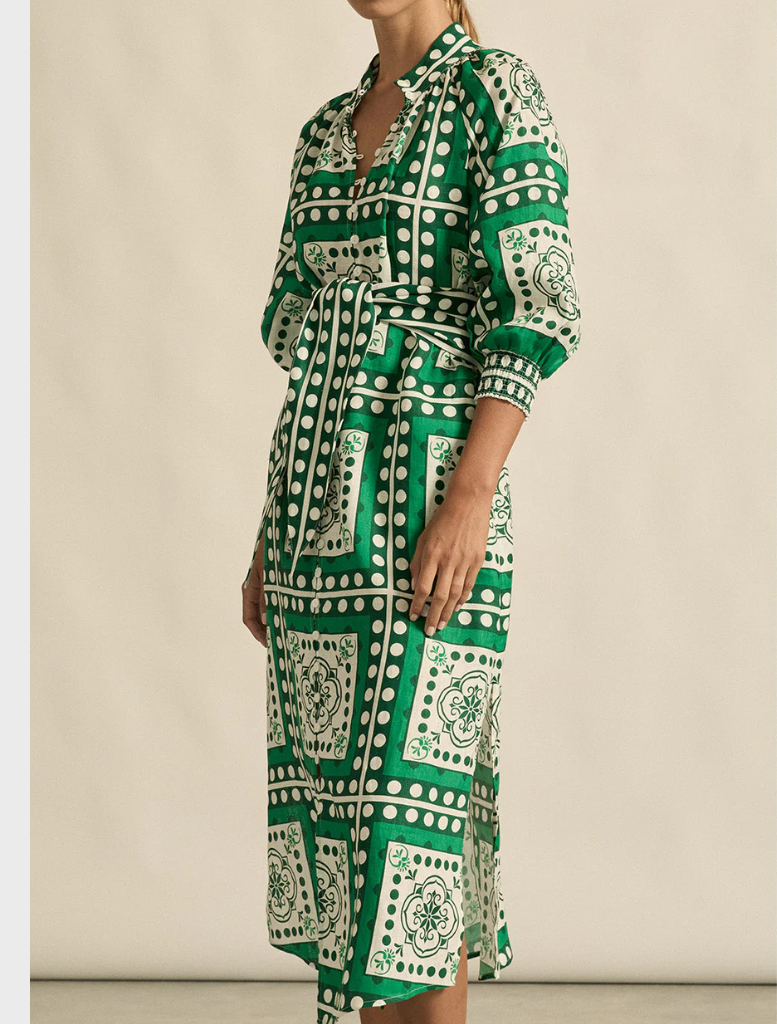 Green and white long sleeve shirt dress adorned with a square pattern, perfect for casual or semi-formal occasions.