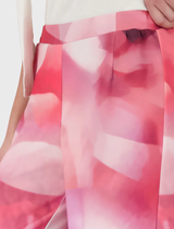 Comfortable wide-leg trousers showcasing an all-over floral gradient print, perfect for a fashionable spring outfit.