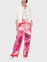 Spring-inspired wide-leg pants with a stretchy waistband and an eye-catching floral gradient print for a chic look.