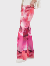 Stylish wide-leg pants adorned with a colorful floral gradient print, designed for comfort with a stretchy waistband.