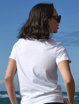 White T-shirt adorned with a flower graphic representing love.
