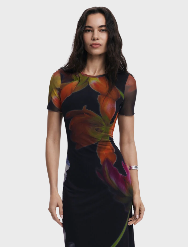 A stylish black dress adorned with a colorful floral print, perfect for various occasions.