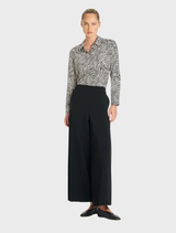 A fossil-hued soft shirt draped elegantly, illustrating its comfortable and casual appearance.