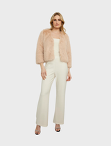 Elegant blush faux fur jacket, showcasing a plush texture and chic silhouette for versatile styling options.
