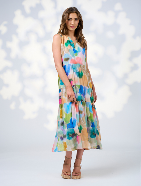 Multi-colored midi dress with a tie detail, featuring a flowing silhouette and a free-spirited design.