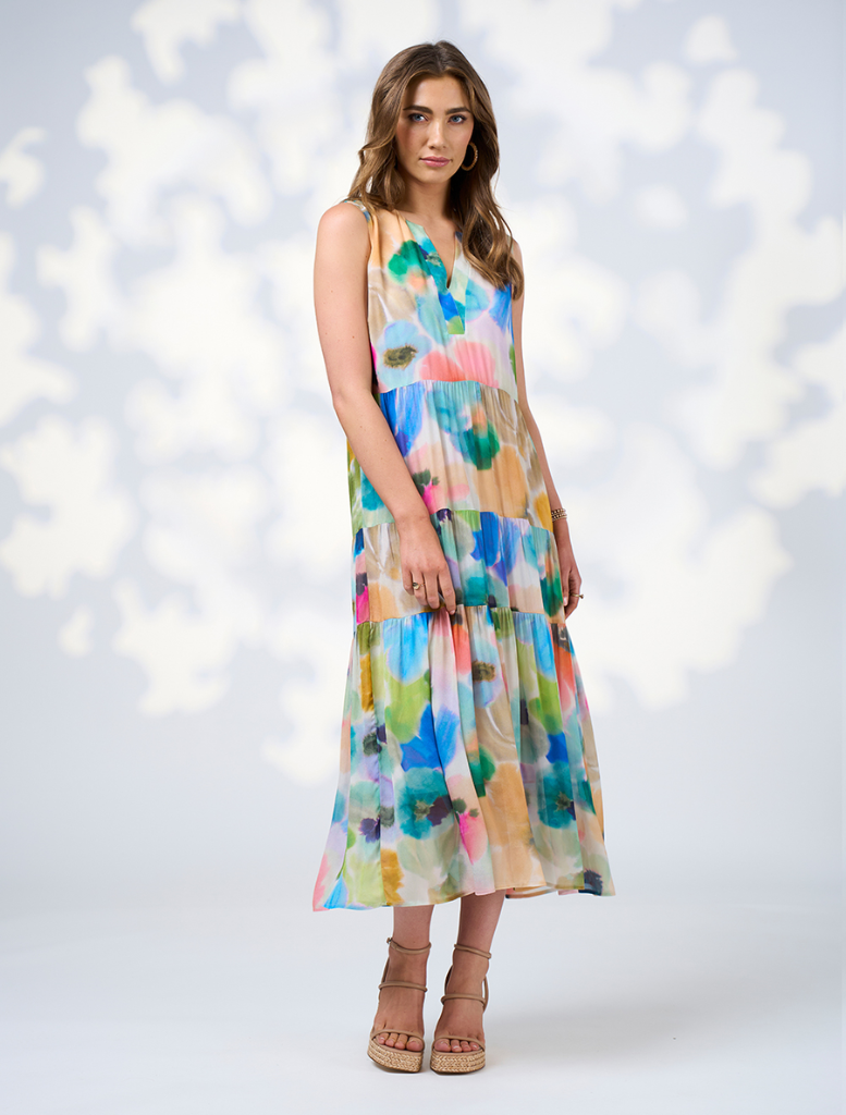 Multi-colored midi dress with a tie detail, featuring a flowing silhouette and a free-spirited design.