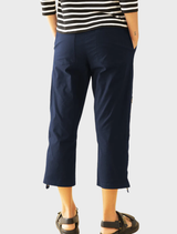 French navy cropped zip cargo pants, designed for comfort and utility with multiple pockets and a stylish cut.