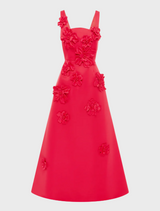 A vibrant red dress adorned with colorful flowers, showcasing a cheerful and stylish design.