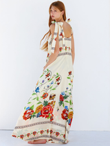 Gabi Dress with a beautiful floral print, designed to enhance femininity and elegance in any wardrobe.