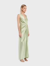 Gaia Maxi V2 dress in a refreshing honeydew shade, highlighting its contemporary style and flowing design.
