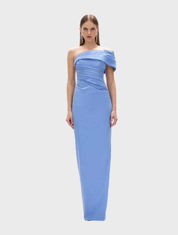 Elegant blue gown with a flowing silhouette, featuring delicate details and a sophisticated design suitable for formal occasions.