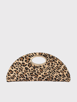 Geena Straw Clutch Bag in leopard print, half-moon shape, woven exterior, detachable shoulder chain, and magnetic closure.